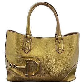 Bolsa Gucci Horsebit em dourado Dourado
