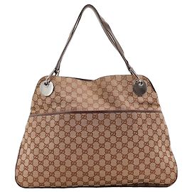 Bolsa de ombro Gucci em canvas monograma GG Marrom