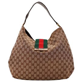 Gucci Bolsa Hobo em canvas Monogram GG Supreme Marrom Monograma