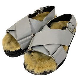 Sandales plates Marni à brides croisées en fourrure Marron