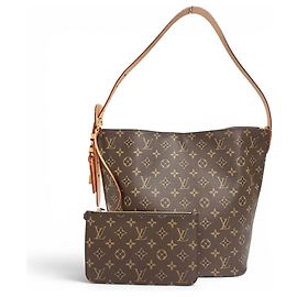 Bolsa Bucket em Canvas Monogram Louis Vuitton Marrom