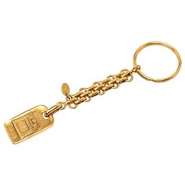 Chanel Portachiavi e Charm per borsa Logo Paris placcato oro D'oro