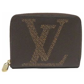 Porta-moedas Monogram Zippy Louis Vuitton Marrom