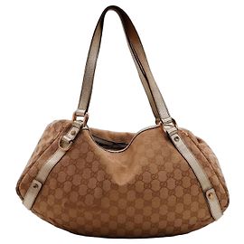 Bolsa Hobo em canvas Monogram Gucci Bege Dourado