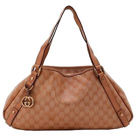 Bolsa de ombro em canvas Monogram Gucci Bege