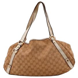 Bolsa de ombro em canvas Monogram Gucci Marrom