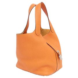 Bolsa Hermès Picotin Lock PM Taurillon Clemence Laranja