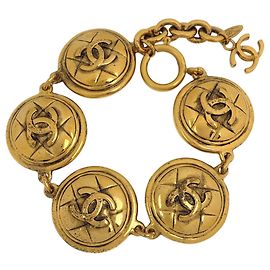 Pulsera de charms Chanel chapada en oro Dorado