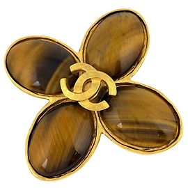 Spilla Chanel Coco Mark con pietra colorata D'oro