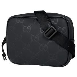 Bolsa de ombro Gucci Edge Mini em couro com efeito borracha GG Preto