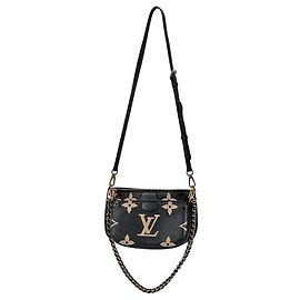 Louis Vuitton Monogram Empreinte Multi Pochette Accessoires Preto Bege