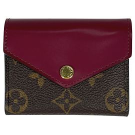 Cartera tríptico Louis Vuitton Portefeuille Zoe Castaño Fucsia