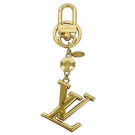Chaveiro Louis Vuitton LV Facet Dourado