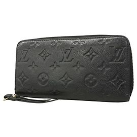 Carteira Zippy Monogram Empreinte Louis Vuitton Preto