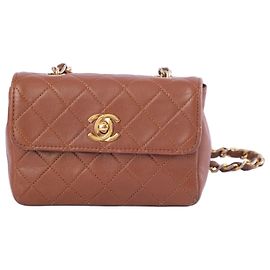 Bolsa transversal Chanel Extra Mini em couro matelassê Marrom Outro