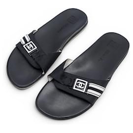 CHANEL G25119 MULES LOGO CC 37 SANDALIAS DE CUERO Y LONA NEGRO Negro