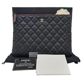 Chanel Pochette Caviar Medium Gold Series Noir