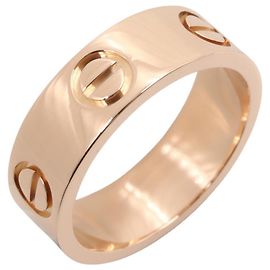 Bague Love de Cartier en or rose 18K Doré