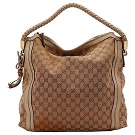 Bolsa Hobo Gucci em lona monogram GG Marrom Monograma
