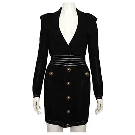 Balmain Schwarzes Strickkleid mit langen Ärmeln und goldenen Knöpfen Schwarz