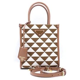 Prada Mini bolsa tote e bolsa de ombro transversal em tecido bordado Symbol Marrom