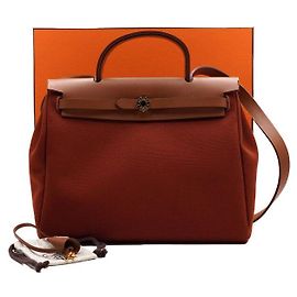 Hermès Tote e bolsa de ombro em couro laranja com ferragens Laranja