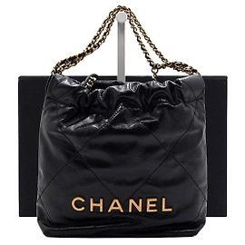 Chanel Mini bolsa de ombro e bolsa transversal em metal dourado Preto