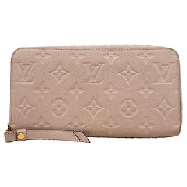 Cartera Zippy Monogram Empreinte Louis Vuitton en color Tourterelle Gris