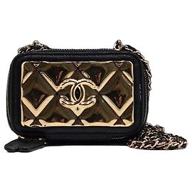 Chanel Mini borsa vanity a tracolla in pelle di agnello nera con catena dorata Nero