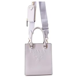 Bolsa de mão Prada Mini Triangle em couro Roxo