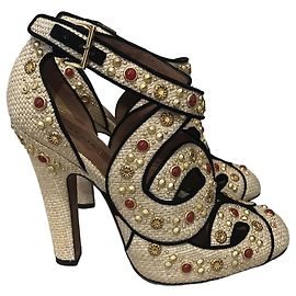 Décolleté Alaïa in rafia beige con borchie e pietre Taglia 40 Beige