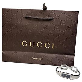Relógio de pulso vintage Gucci em aço inoxidável e couro, prata e preto Prata