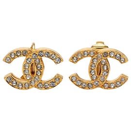 Boucles d'oreilles clips Chanel CC plaqué or et strass dorées Doré