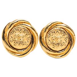 Boucles d'oreilles rondes à clip Chanel CC plaquées or Doré
