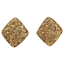Orecchini a clip Chanel CC placcati in oro e diamanti D'oro