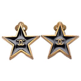 Boucles d'oreilles clips Chanel CC noires émaillées avec étoile plaquées or Noir