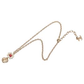 Collier avec pendentif cœur en fleurs de fausses perles et strass plaqué or Gold Chanel CC Doré