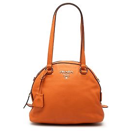 Sac à main dôme Prada Vitello Daino orange Orange