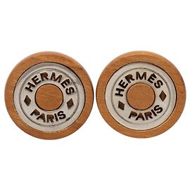 Boucles d'oreilles clips Sellier en bois et palladium marron Hermès Marron