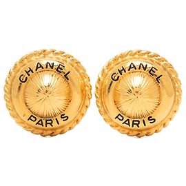 Boucles d'oreilles clips rondes avec logo Chanel CC plaqué or Doré