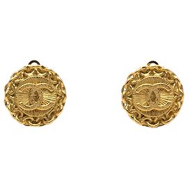 Boucles d'oreilles rondes à clip Chanel CC plaquées or Doré