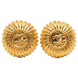 Orecchini a clip rotondi CC Chanel placcati oro D'oro