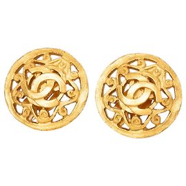 Boucles d'oreilles clips rondes Arabesque Chanel CC plaquées or Doré