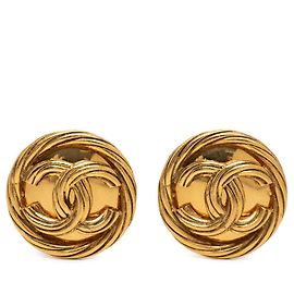 Boucles d'oreilles clips rondes torsadées Chanel CC plaquées or Doré