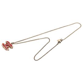 Collier pendentif émaillé Chanel CC plaqué or doré Doré