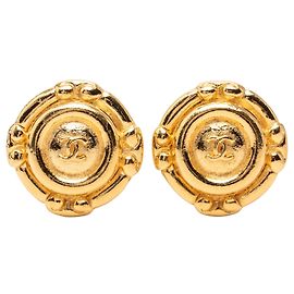 Orecchini a clip rotondi CC Chanel placcati oro D'oro
