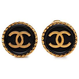 Boucles d'oreilles clips rondes Chanel CC plaquées or et émail Doré
