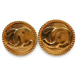 Orecchini a clip rotondi Chanel CC placcati in oro D'oro