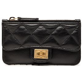 Tarjetero Chanel Reissue 2.55 de piel de becerro envejecida acolchada negra Negro