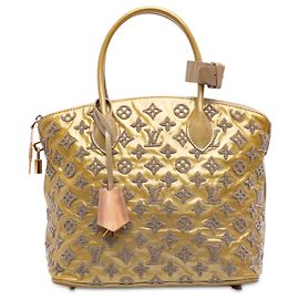 Bolsa Louis Vuitton Monogram Fascination Lockit dourada Dourado